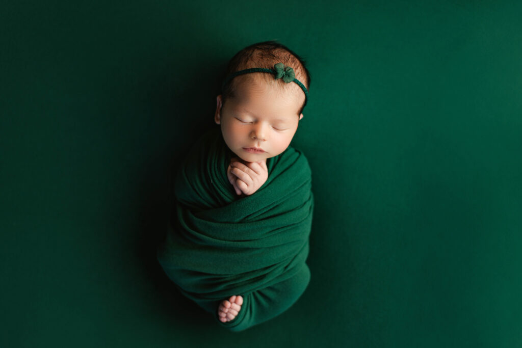 Baby girl in green wrap