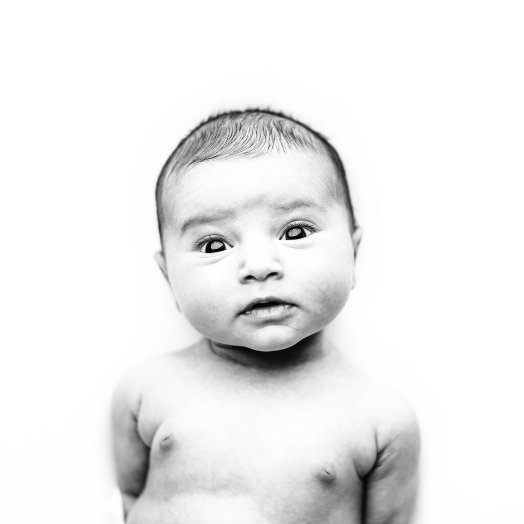 Baby Mugshot in black and white