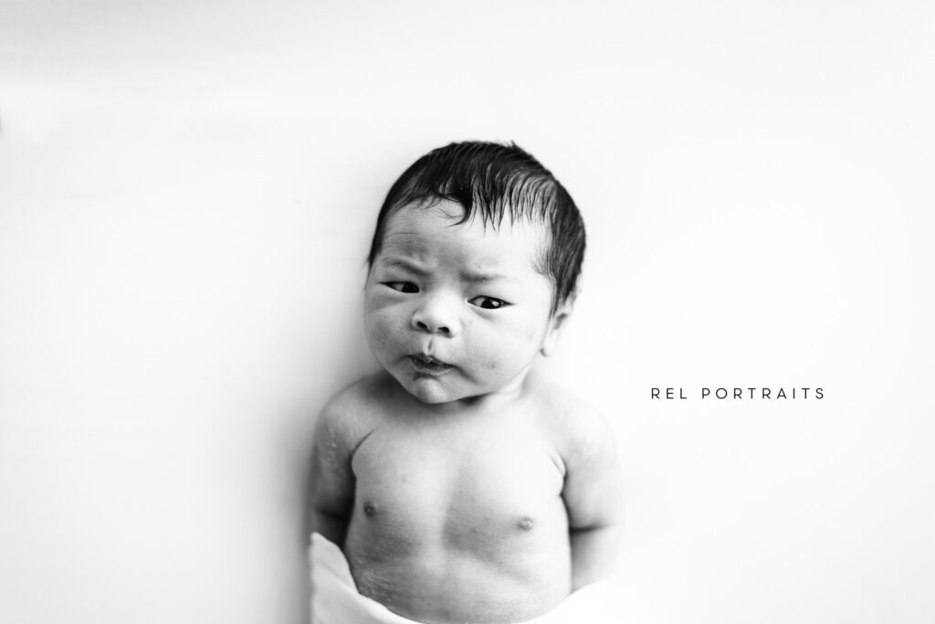 Grumpy newborn from a newborn photographer