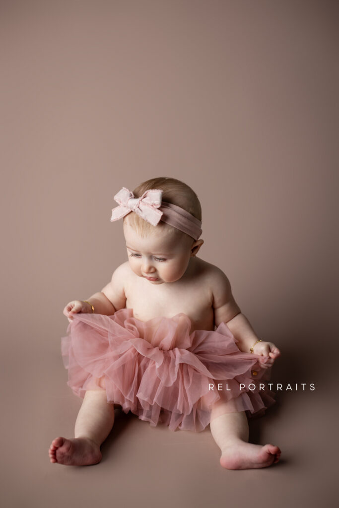 Milestone session of baby girl in pink tutu