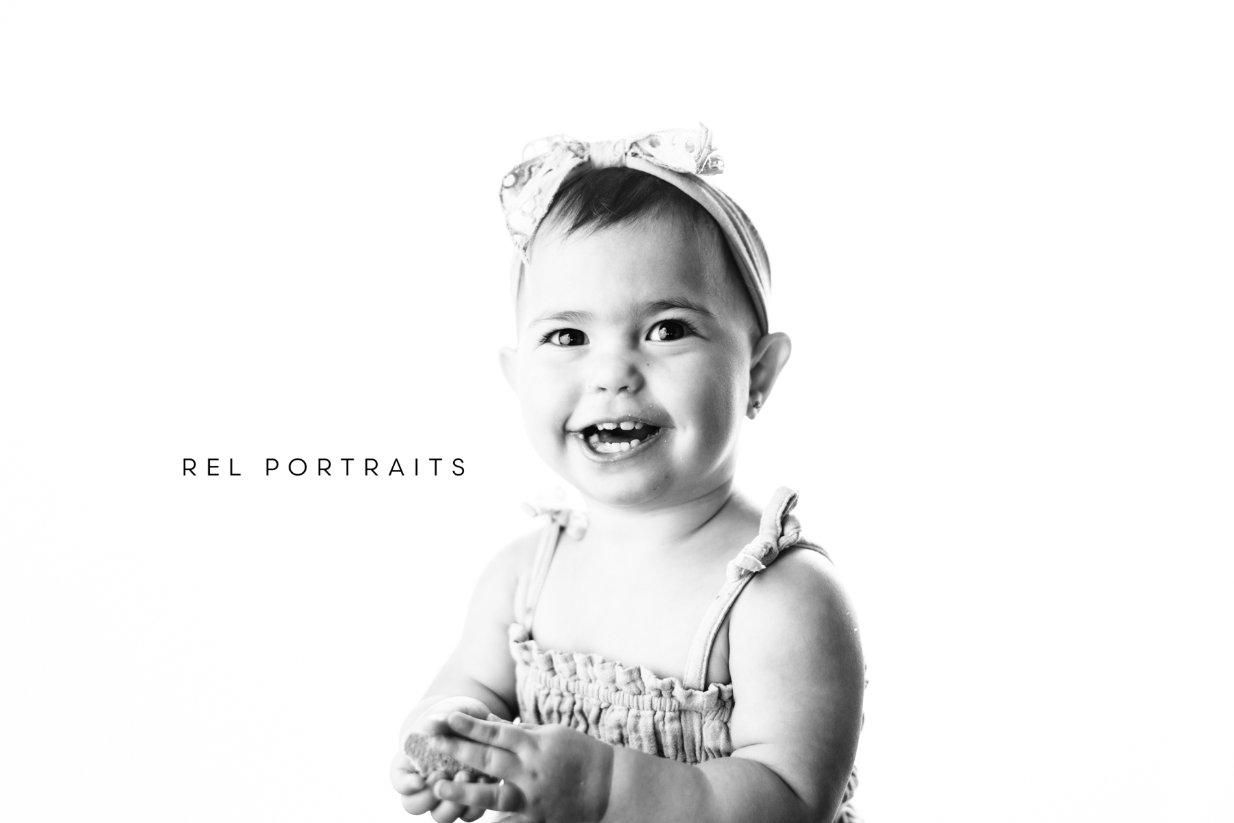 Baby Girl Smiling in black and white milestone photo