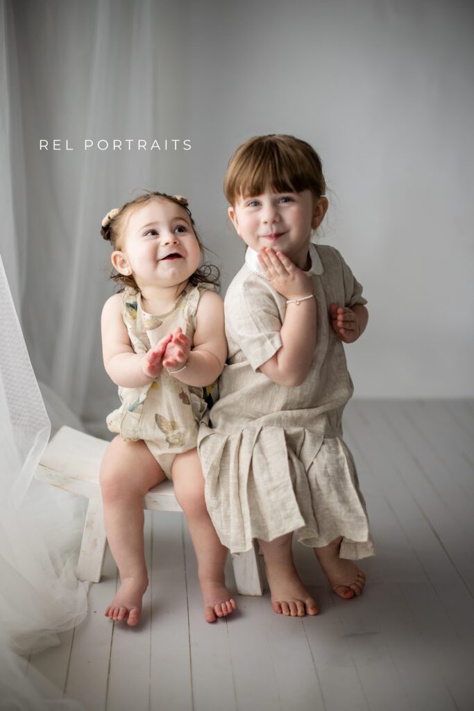 Sister photo session sitting together