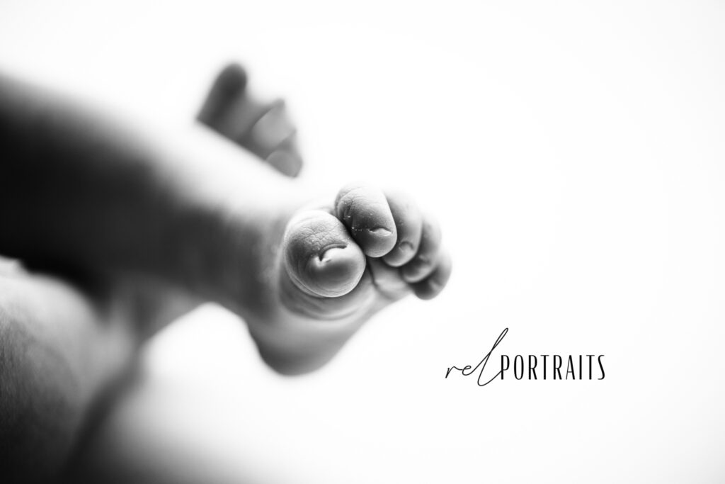 Newborn baby black and white little toes