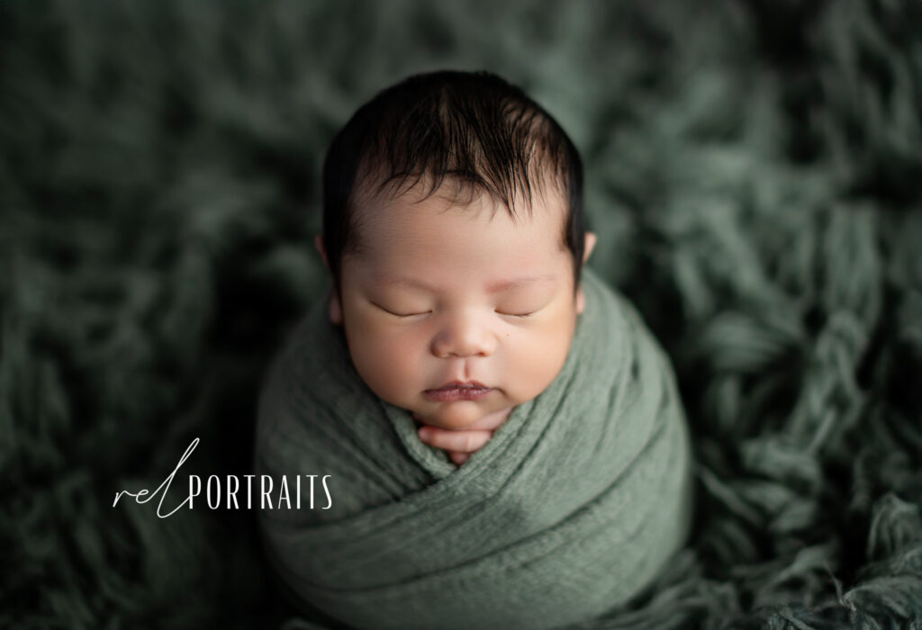 newborn photoshoot of baby wrapped in chicago