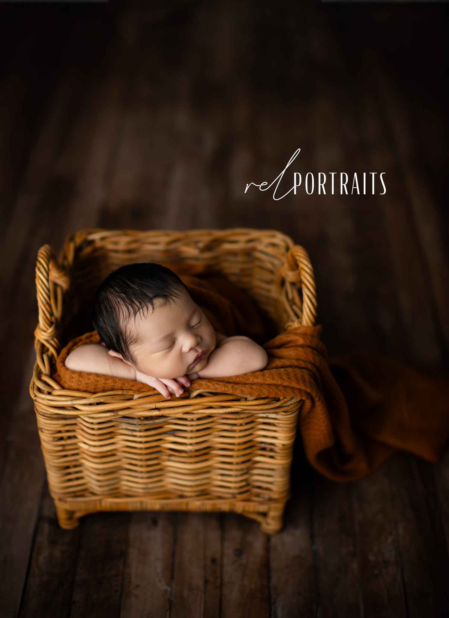 chicago wicker basket of newborn at photoshoot