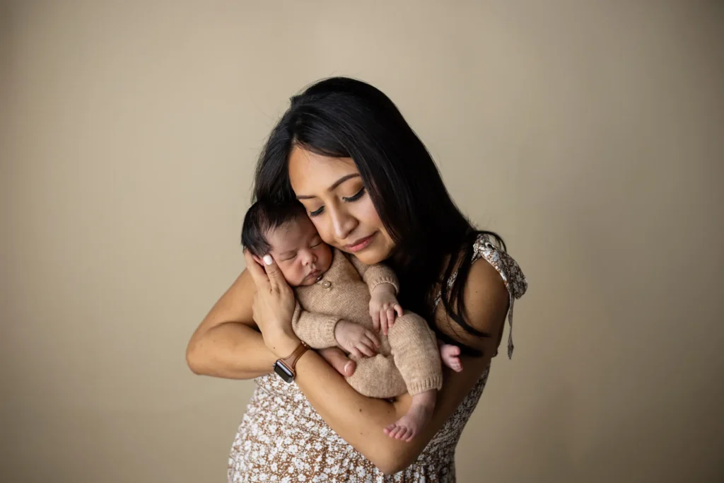 Mom Wearing Brown dress for newborn photoshoot