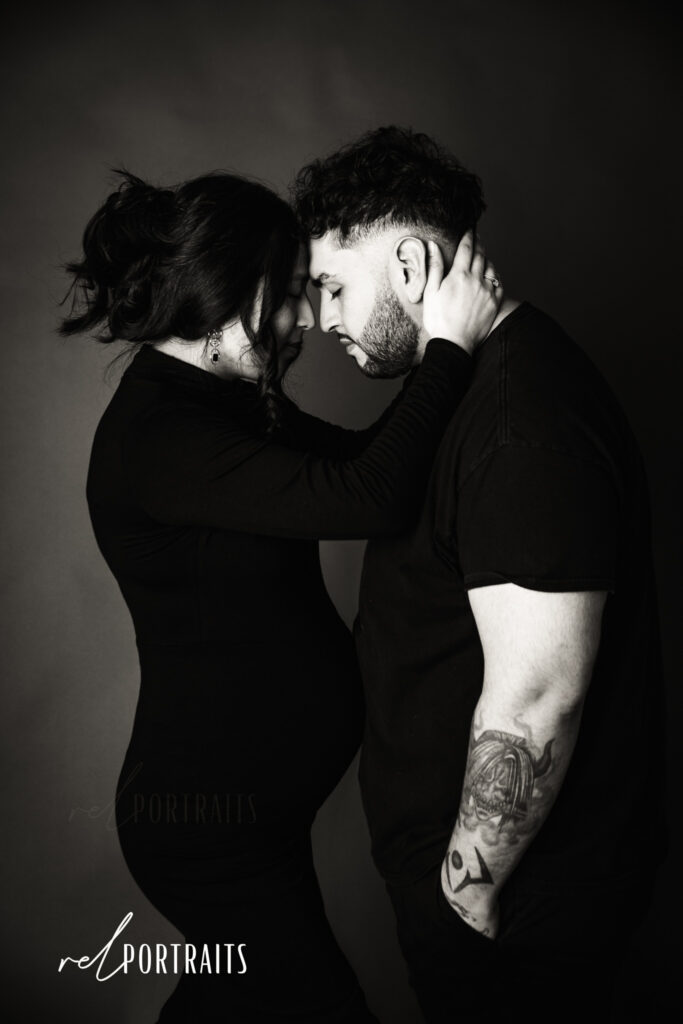 black and white couple with pregnant mom